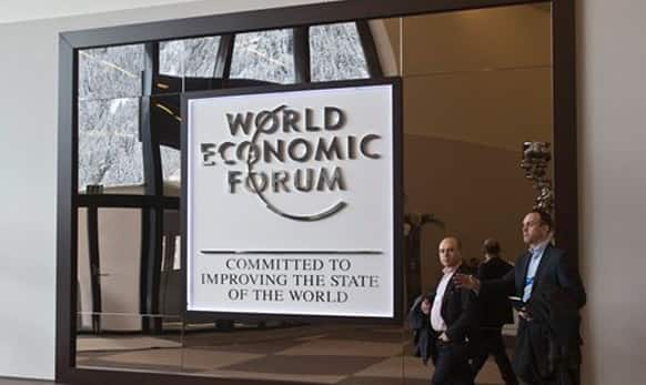 Participants walk in the main entrance hall of the Congress Center the day before the opening of the annual meeting of the World Economic Forum in Davos, Switzerland, Tuesday, Jan. 20, 2015.