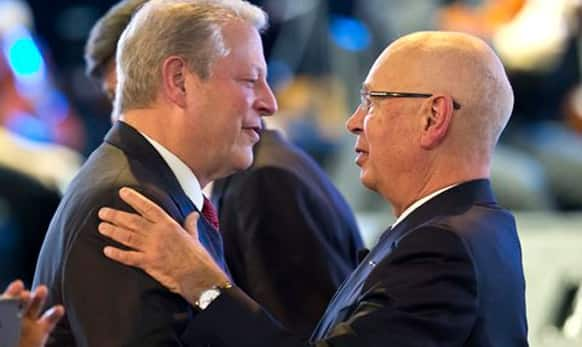 Former U.S Vice President Al Gore, is greeted by President and founder of the World Economic Forum Klaus Schwab during the Cristal Award of the WEF.