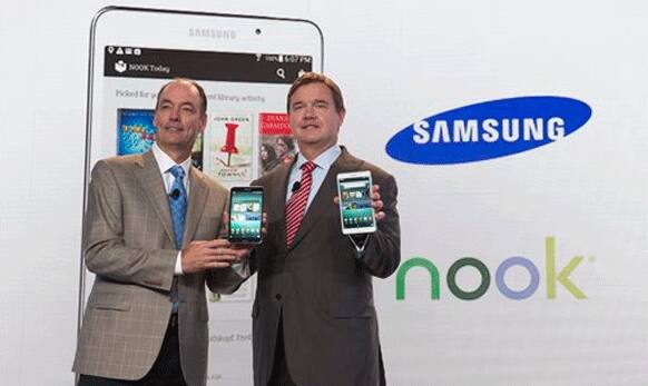 Tim Baxter, president of Samsung Electronics America, left, and Mike Huseby, CEO of Barnes & Noble, pose for a photograph.