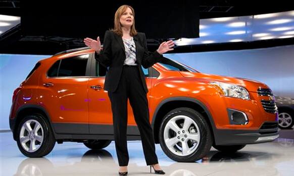 Mary Barra, CEO of General Motors, talks in front of the Chevrolet Trax at the 2014 New York International Auto Show. 