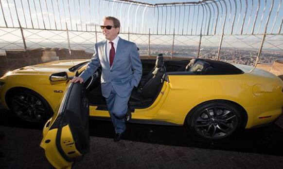 Bill Ford, Ford Motor Company's executive chairman, stands with the all-new 2015 Mustang convertible.