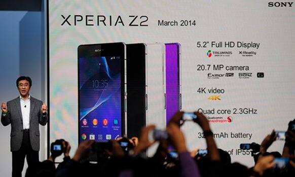 President and CEO of Sony Mobile Communications Kunimasa Suzuki presents the Smartphone Xperia Z2 during the Mobile World Congress, the world's largest mobile phone trade show in Barcelona, Spain, Monday, Feb. 24, 2014. 