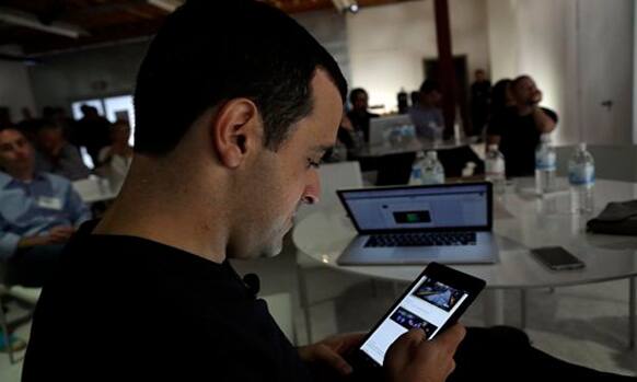 Hugo Barra, vice president Android product management at Google, displays the new Nexus 7 tablet in San Francisco on July 24, 2013.