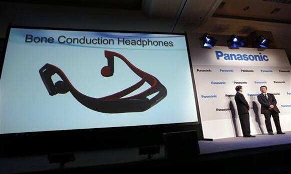 Panasonic's Shiro Kitajima, far right, and Vic Carlson, introduces the bone construction headphones during a news conference at the International Consumer Electronics Show