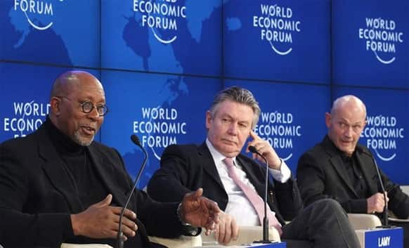 Pascal Lamy (R) , Director-General, World Trade Organization (WTO), EU Trade Commission Karel De Gucht (C) and U.S. Trade Representative Ron Kirk attend a session at the World Economic Forum.