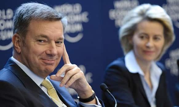 Patrick G. de Maeseneire, left, CEO of the human resources company Adecco Group and German Labor Minister Ursula von der Leyen, right, attend a panel session of the 42nd annual meeting of the World Economic Forum, WEF, in Davos.