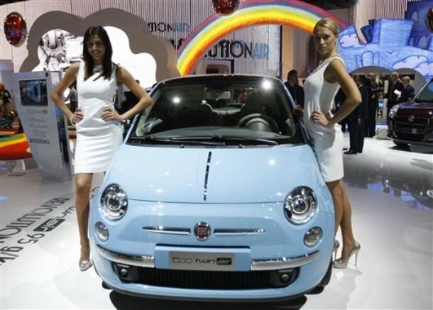 Models pose at the Fiat 500 TwinAir city car 