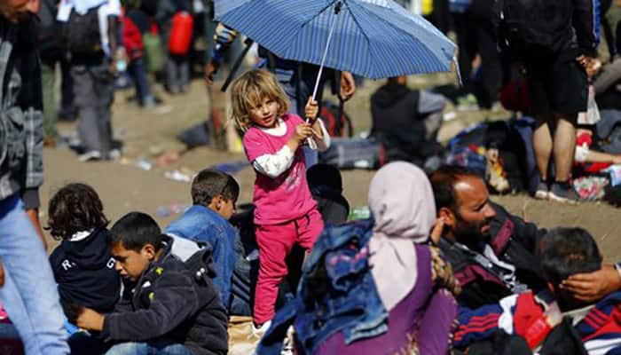 EU`s Juncker urges `bold` plan for 160,000 refugees