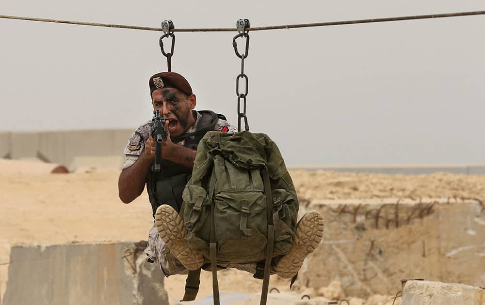 A Lebanese commando demonstrates his skills during an exhibition of the Security Middle East Shows (SMES), in Beirut, Lebanon.