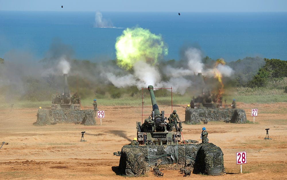 Taiwan's military fire artillery from M110A2 self-propelled Howitzers during the annual Han Kuang exercises in Hsinchu, north eastern Taiwan.