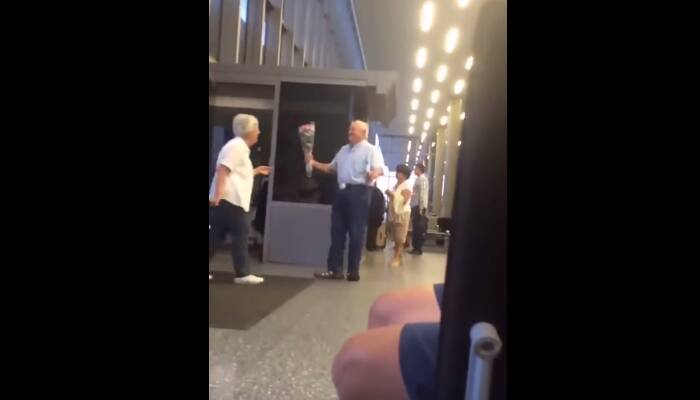 Viral video of old man receiving wife at airport will melt your heart - Watch