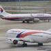 Hackers target Malaysia Airlines, threaten data dump