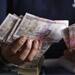 Rupee down 7 paise at 61.48 against US dollar 