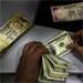 Rupee ends 3 paise higher at 63.52 against US dollar