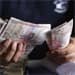 Rupee surges by 21 paise at 63.39 against dollar
