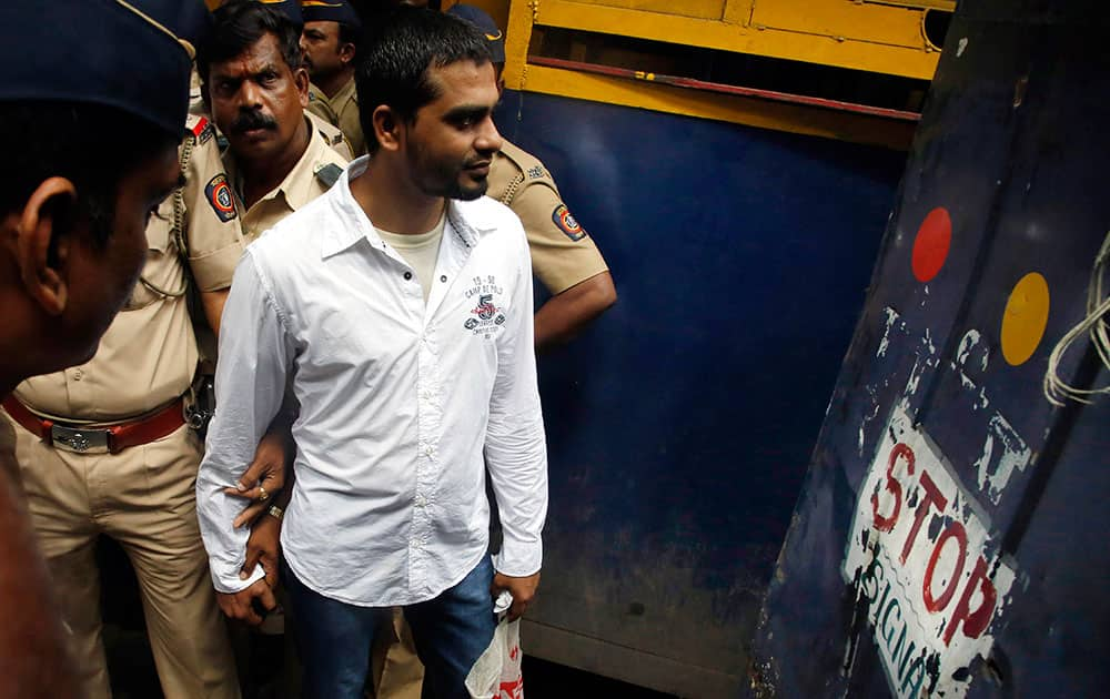 A defendant, one of the 13 accused in the 2006 Mumbai train bombings case leaves for the prison after the court verdict, in Mumbai.