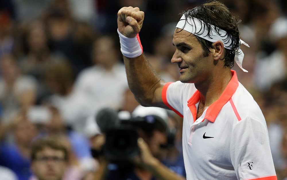 Roger Federer, of Switzerland, reacts after beating Richard Gasquet, of France, during a quarterfinal match at the U.S. Open tennis tournament.