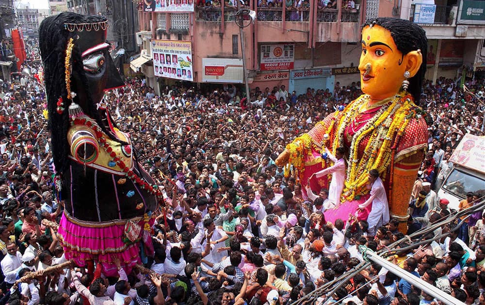 Devotees gather to celebrate the Peli and Kali Maarbat procession as part of Pola celebrations in Nagpur.
