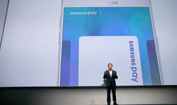 JK Shin, president and CEO of Samsung Electronics, talks about Samsung Pay during a presentation.