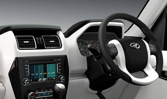 Sporty steering wheel comes with Audio and Cruise controls.