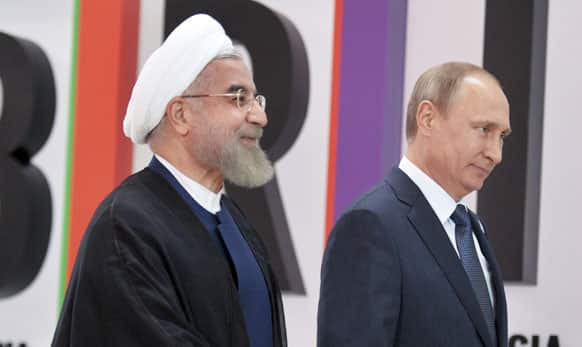 Russian President Vladimir Putin, right, and Iran's President Hassan Rouhani.