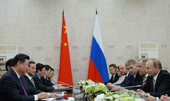 Russian President Vladimir Putin, right, and Chinese President Xi Jinping, left, attend talks during a BRICS summit in Ufa.