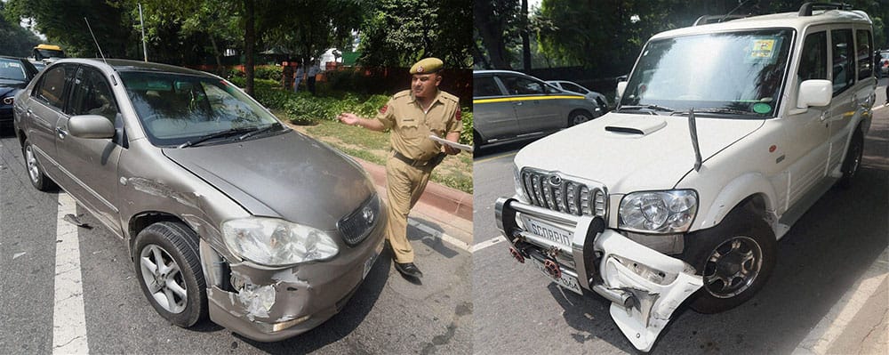 A combo picture showing former Bihar chief minister and HAM(S) chief Jitan Ram Manhjis car (R) which collides with a doctors car (L) in a minor accident outside the BJP president Amit Shahs residence in New Delhi.