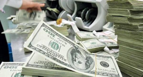 Rupee gains 14 paise at 66.40 against US dollar