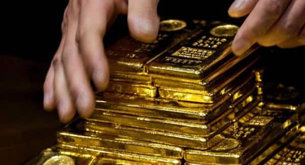 Gold eases to around one-month low as Fed meeting nears