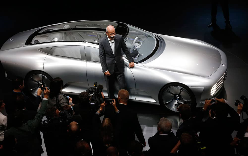 Daimler CEO Dieter Zetsche stands in front of a Mercedes show car 'Digital Transformer' during an event of the Daimler group on the eve of the Frankfurt Auto Show IAA in Frankfurt, Germany.