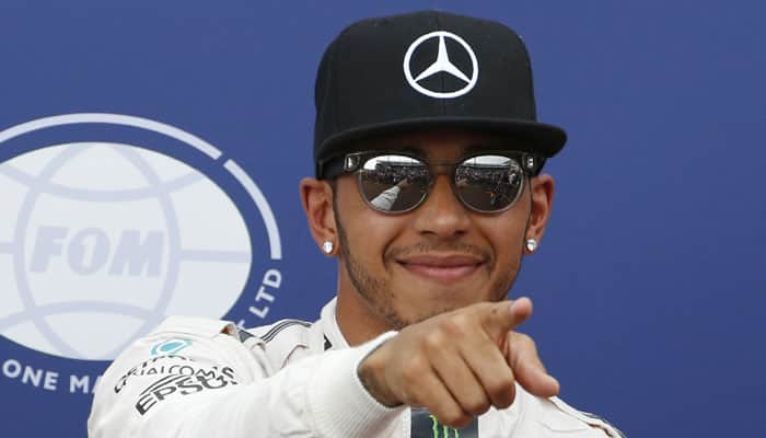 Lewis Hamilton looms large in smoky Singapore