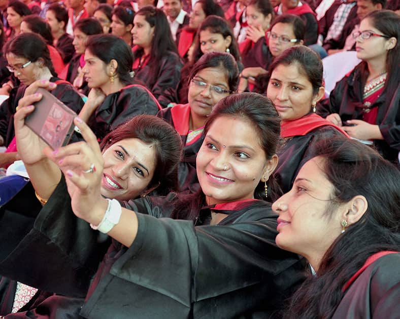 Students of College of Veterinary and Animal Sciences taking selfie during their convocation in Bikaner.