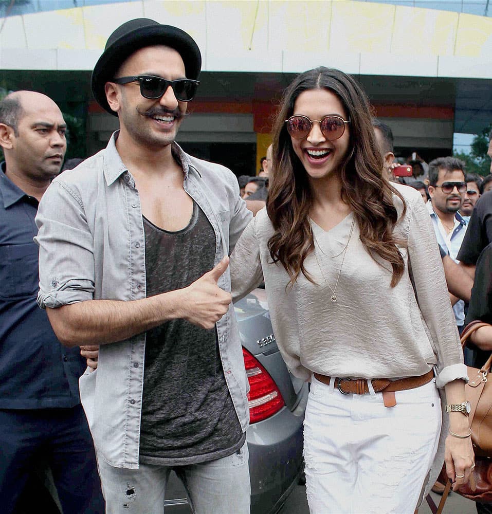 Bollywood actors Ranvir Singh and Deepika Padukone during the launch of the song Gajanana from their upcoming film Baijarao Mastani in Pune, Maharashtra.