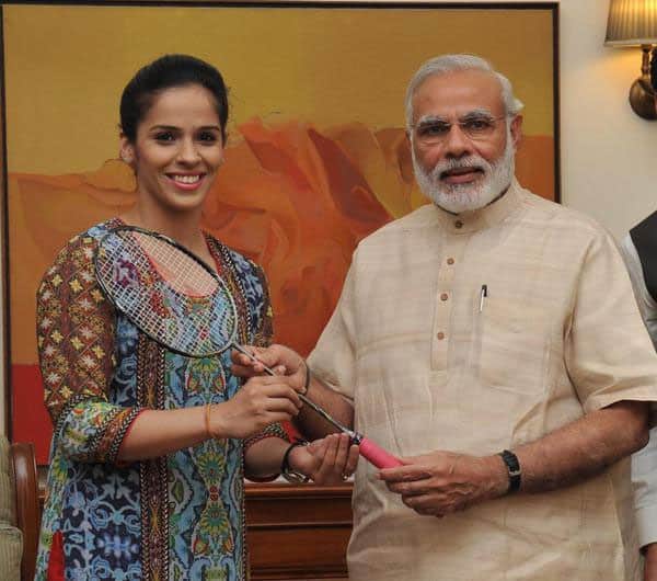 Presenting my badminton racquet to Modi sir for his birthday which is tomorrow . It is a great honour to meet him. - Twitter@NSaina