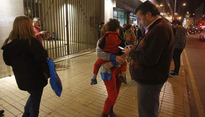 Powerful quake hits off coast of Chile, triggers tsunami warning; evacuations ordered