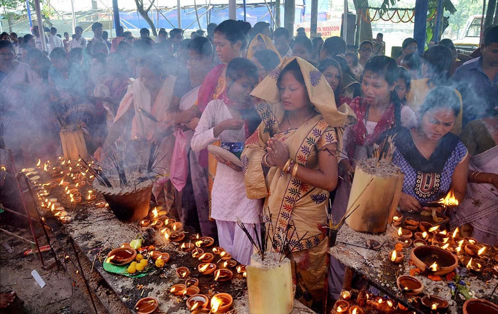 Devotees offers prayers at the Latashil Ganesh Temple in Guwahati during the occasion of Ganesh Festival.