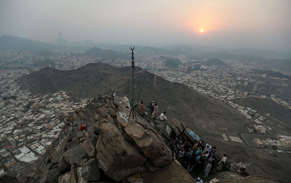 Muslim pilgrims queue atop Noor Mountain outside the Hiraa cave, where Prophet Muhammad received his first revelation from God to preach Islam.