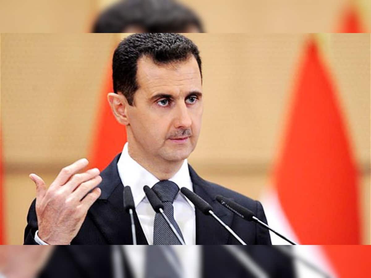 US says Assad must go, timing down to negotiation