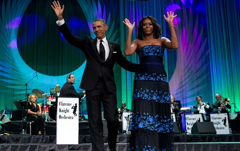 President Barack Obama and first lady Michelle Obama arrive at the Congressional Black Caucus Foundation’s 45th Annual Legislative Conference Phoenix Awards Dinner at the Walter E. Washington Convention Center in Washington.