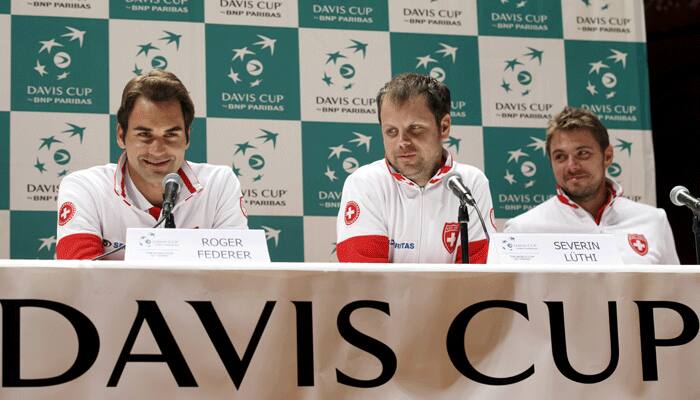 Roger Federer wins to keep Swiss in Davis Cup World Group