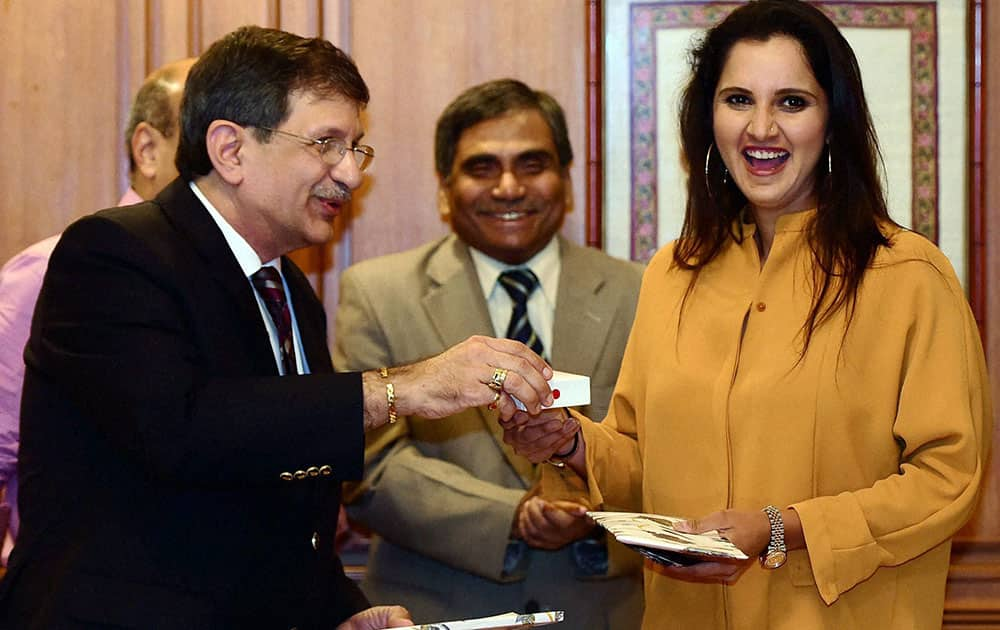 Tennis player Sania Mirza during an event where she was confered with a honorary membership of Cricket Club of India by K Nicholson, President of CCI in Mumbai.