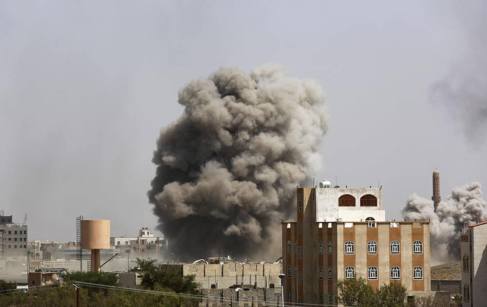 Smoke rises after a Saudi-led airstrike hits an army academy in Sanaa, Yemen.