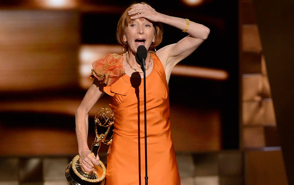 Jane Anderson accepts the award for outstanding writing for a limited series, movie or a dramatic special for “Olive Kitteridge” at the 67th Primetime Emmy Awards.