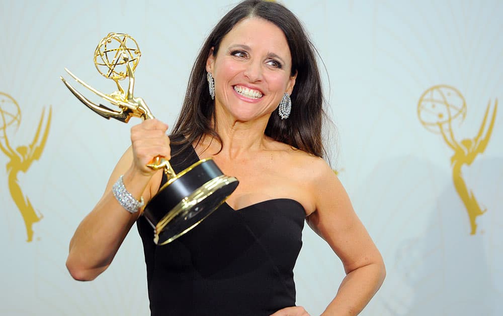 Julia Louis-Dreyfus poses with the award for outstanding lead actress in a comedy series for 