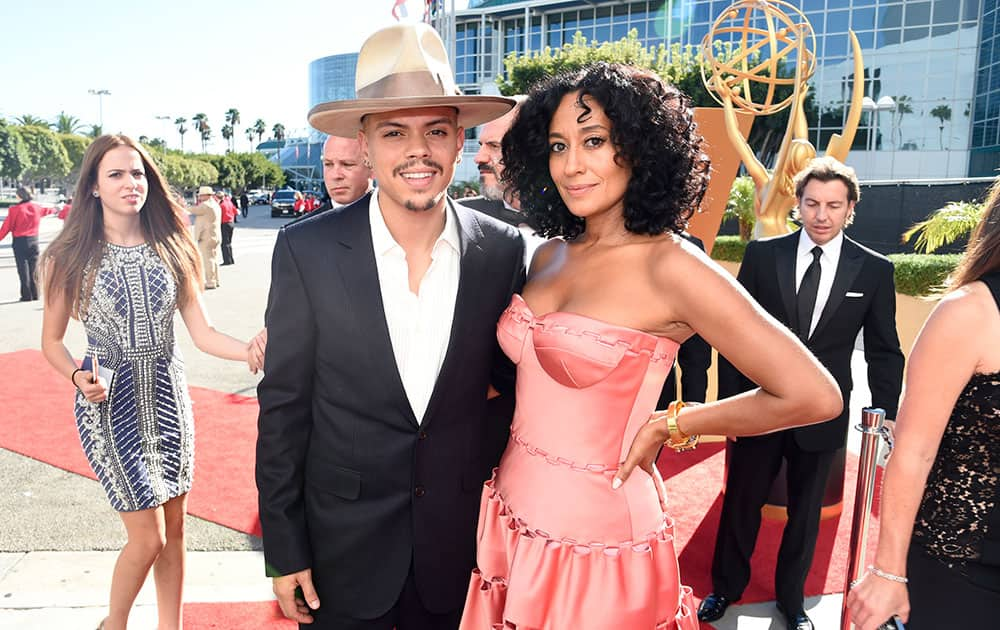 Evan Ross, left, and Tracee Ellis Ross arrive at the 67th Primetime Emmy Awards.