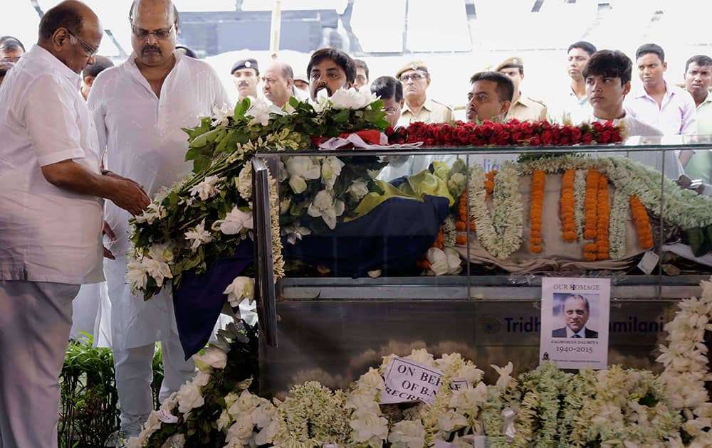 Former Board of Control for Cricket in India (BCCI) President Sharad Pawar pays tribute to the body of Jagmohan Dalmiya, in glass casket, BCCI president and former International Cricket Council chief during his funeral in Kolkata.