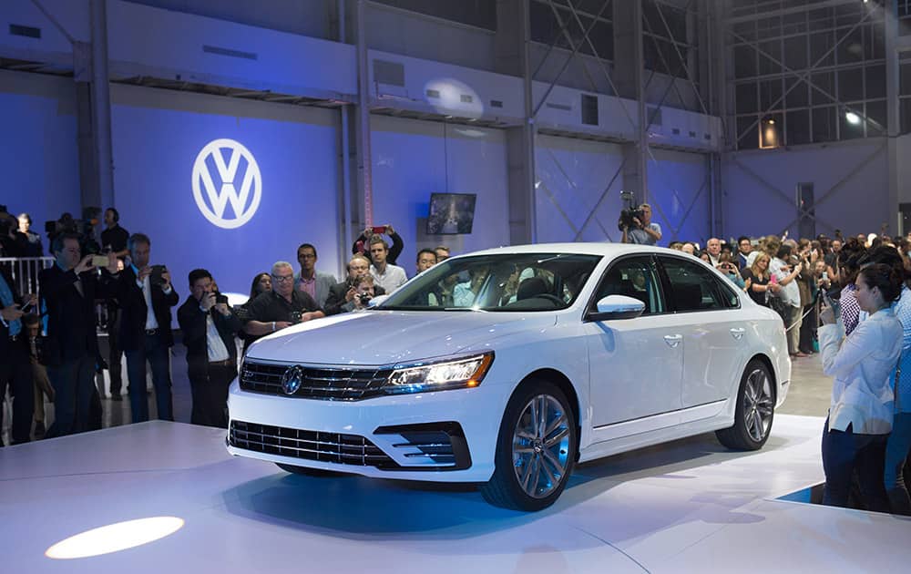 People view the new Volkswagen Passat during a reveal event at the Brooklyn Navy Yard.