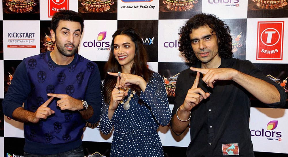 Bollywood actors Ranbir Kapoor, Deepika Padukone and filmmaker Imtiaz Ali during a musical event of T Series in Mumbai.