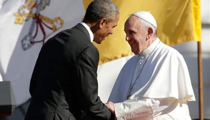 Pope Francis arrives at the White House as thousands cheer