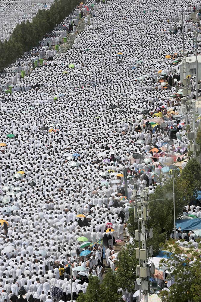 Hundreds of thousands of Muslim pilgrims pray outside Namira mosque in Arafat, on the second and most significant day of the annual hajj pilgrimage, near the holy city of Mecca, Saudi Arabia.